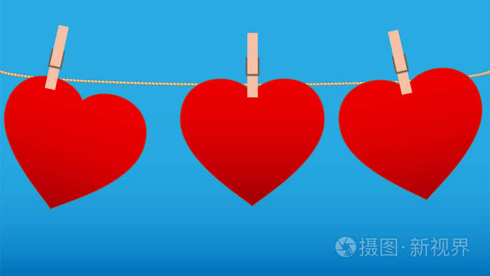 三颗心为情人节挂在绳子上