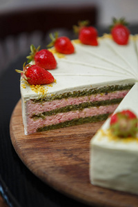  strawberry biscuit decorated with fresh straberries on top.Crea