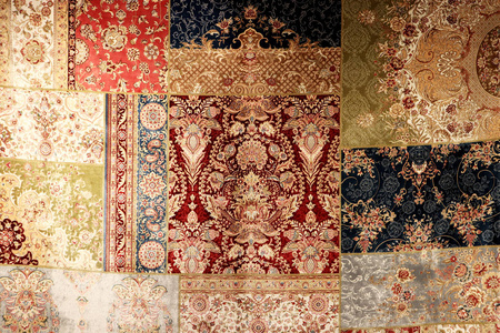 美丽的纺织地毯装饰背景。 土耳其东方地毯的质地。 传统的地板盖设计背景。