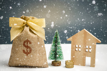 木屋和圣诞树还有一袋钱。 圣诞节出售房地产。 买房子的新年折扣。 以低价购买公寓。 寒假和度假。 美元牌