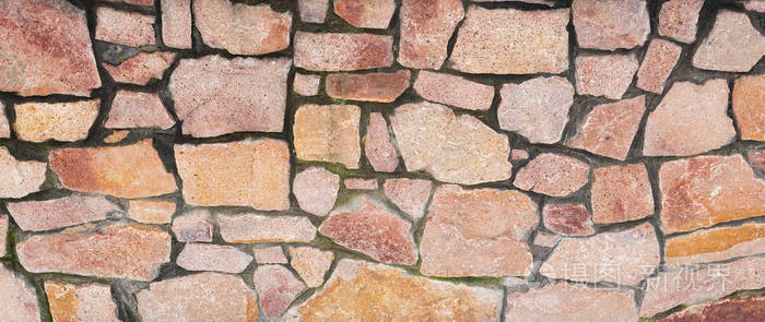 花岗岩制成的石栅栏的纹理。 背景