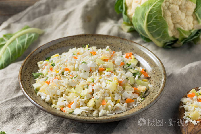 生有机白菜花饭放在碗里照片 正版商用图片164m9h 摄图新视界 生有机白菜花饭放在碗里照片 正版商用图片164m9h 摄图新视界