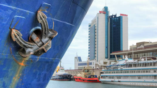 s anchor against the background of the port of Odessa