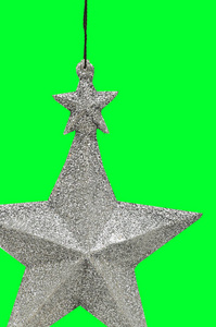 s silver fivepointed star  on the green isolated background. Th