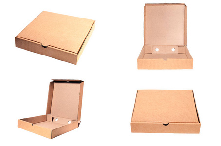 特写空开和封闭的纸板米色披萨盒。 概念订单，快递餐，晚餐，午餐，从意大利菜餐厅，纸箱容器。