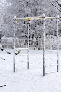 s Playground in the Park covered with snow