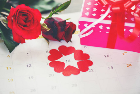 s day pink gift box and red roses flower
