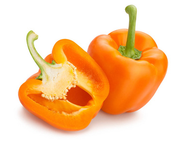 白色背景下分离的整粒橙铃椒照片