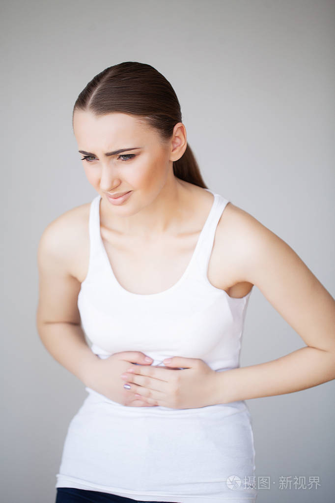 胃痛.有胃痛的妇女, 遭受腹痛的女性