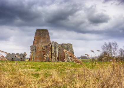 s Abbey gatehouse and mill on the Norfolk Broads during a winter