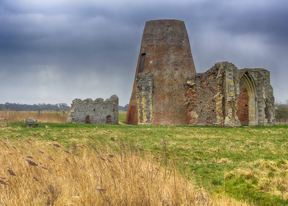 s Abbey gatehouse and mill on the Norfolk Broads during a winter