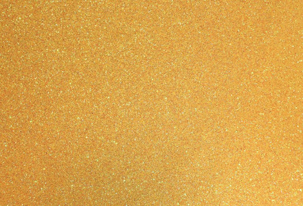 金色的黄色背景,有大量闪闪发光的闪光完美作为背景.照片