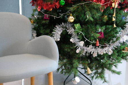  gray chair in living room. xmas holiday celebration in december