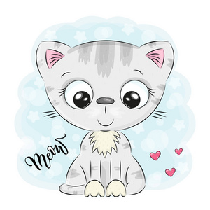 蓝色背景上的可爱卡通小猫.照片