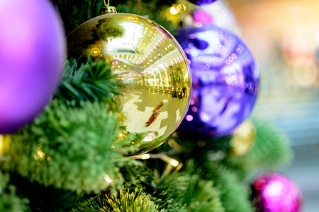 s toy, Christmas. Closeup of an orange glass ball with a snowma