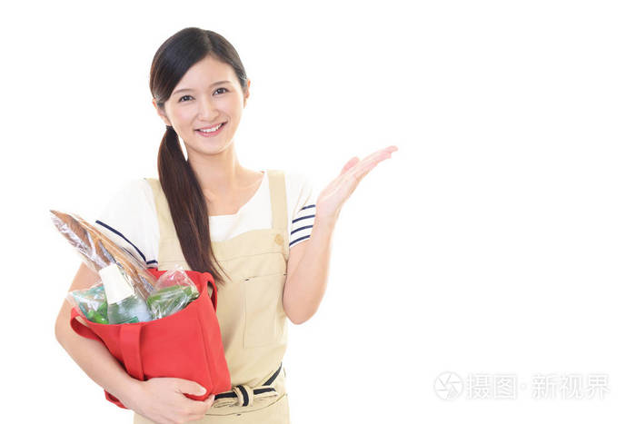 穿围裙的亚洲家庭主妇