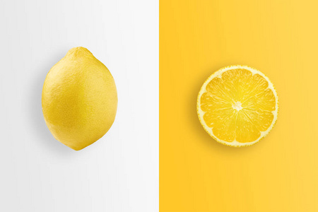 创意背景柠檬和柠檬片在白色和黄色背景。 平躺复制空间。 营养新鲜水果天然产品果汁的概念。