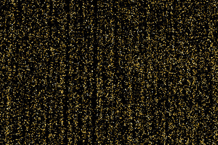 金色的闪光纹理隔离在黑色上琥珀颗粒的颜色庆祝背景纸屑的金色爆炸