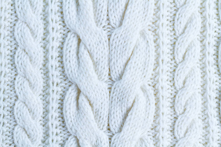 白色纱线的质地。 针织及冬装