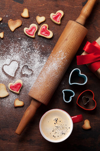 s day greeting card with cooking heart shaped cookies on wooden 