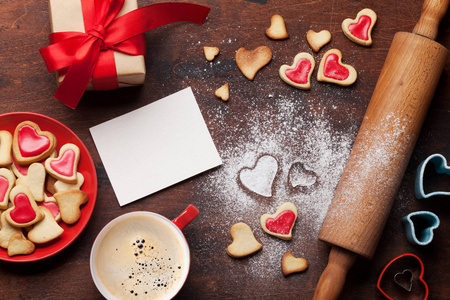 s day greeting card with cooking heart shaped cookies on wooden 