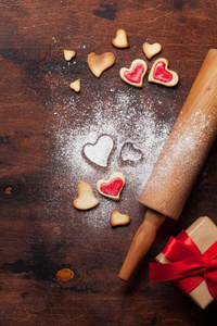 s day greeting card with cooking heart shaped cookies on wooden 