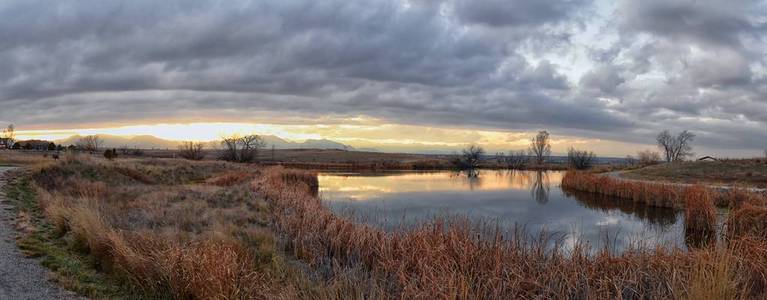 s Pond walking path, Reflecting Sunset in Broomfield Colorado su