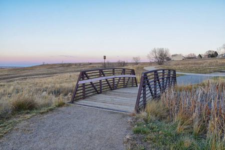 s Pond walking path, Reflecting Sunset in Broomfield Colorado su