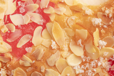 西班牙典型的顿悟蛋糕蔷薇与水果背景