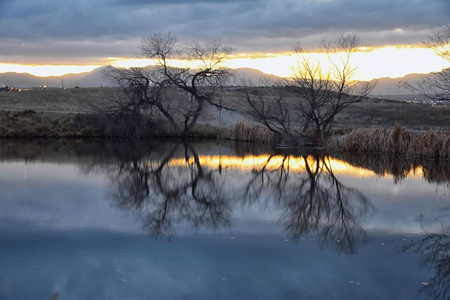 s Pond walking path, Reflecting Sunset in Broomfield Colorado su