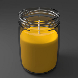 蜡烛在一罐灰色背景特写。