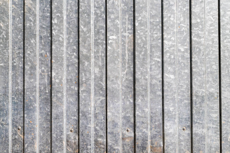 波纹金属压型面板.外观装饰用灰色金属壁板,波纹铁皮背景照片