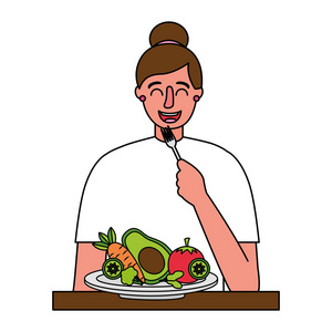 妇女吃健康的食物与叉子