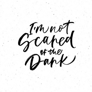 m not scared of the dark phrase handwritten with a calligraphic 