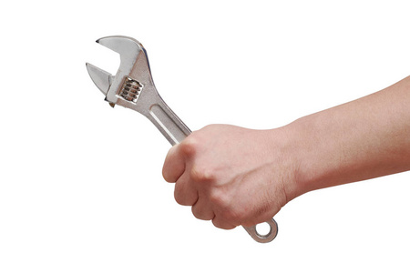 s hand holding adjustable wrench on white background.  isolated