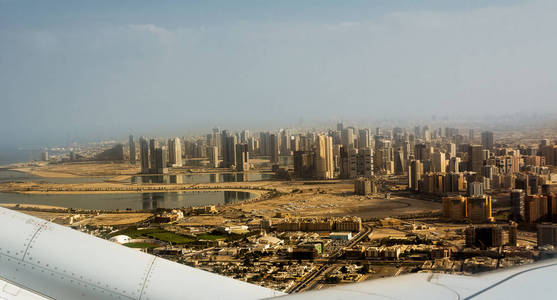 s buildings seen from the airplane taking off