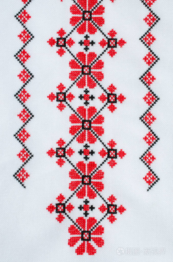 十字绣图案工艺刺绣. 背景有刺绣. 几何民间装饰品.