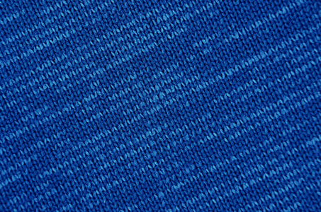 贴紧球衣面料纹理布背景照片