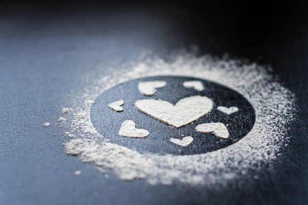 s Day. Picture of heart of flour on a black background. Happy Va