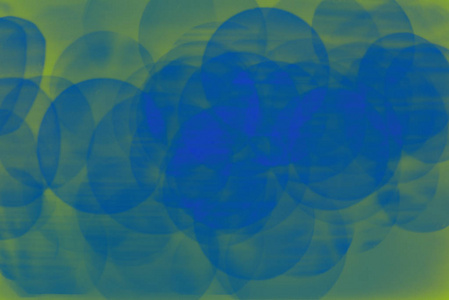 蓝色和绿色的bokeh抽象在未聚焦的背景，颜色bokeh背景和纹理，彩色带线与长曝光和运动灯。