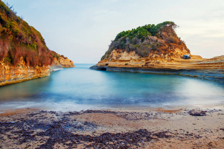 Amour beach with beautiful rocky coastline in amazing blue Ionia