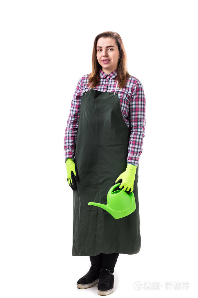 微笑的女人的肖像专业园丁或花匠穿着围裙手里拿着白色背景上孤立的