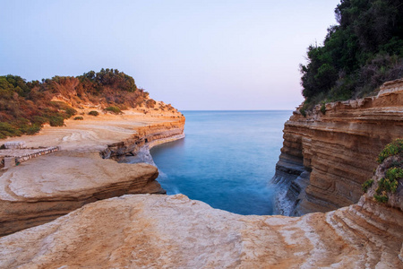 Amour beach with beautiful rocky coastline in amazing blue Ionia