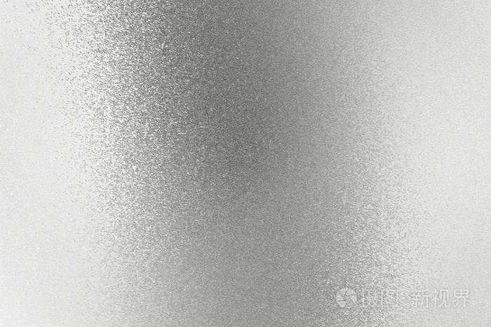 粗糙的灰色银片抽象背景上的反射纹理