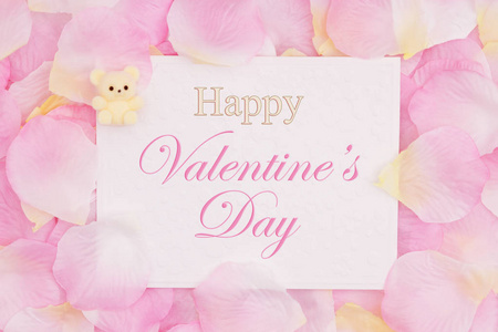 s Day greeting card with a small teddy bear on pink rose flower 