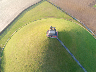 s Mound with farm land around.  The immense Butte Du Lion on the