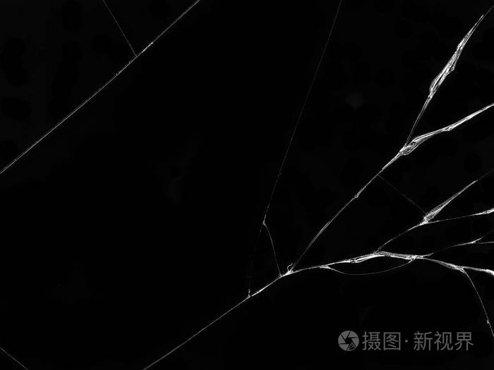 黑色背景上破裂的玻璃纹理孤立的真实裂纹玻璃效应
