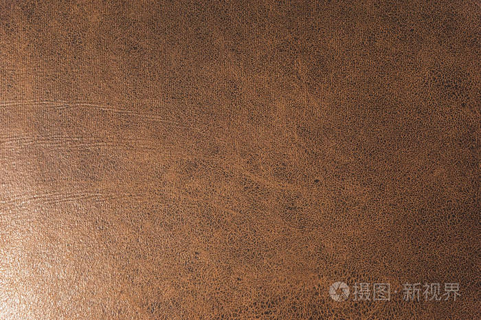 纹理背景表面的纺织内饰家具特写.皮革棕色面料结构照片-正版商用图片