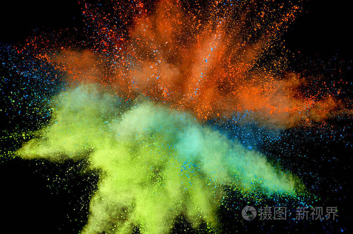 有色粉末爆炸.背景上的抽象特写尘埃.五颜六色的爆炸.油漆霍利