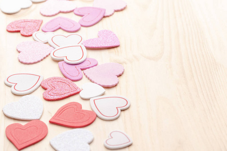 s day background of multicolored hearts on the table